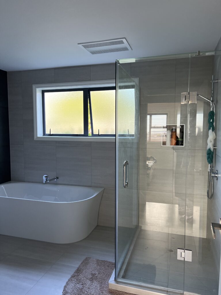 Shower Installation: What you should know
In general, most of the customers select the frameless glass shower kits. For elderly people or in rest home, framed showers are also popular. If you have a big bathroom, you can install a larger shower. If you have 1600mm wide inline shower, we suggest you install a sliding door. If you have a armchair for elderly, we suggest you to install a wide sliding door or walk-in shower with one glass panel. There are 90 degree showers, inline showers, Walk-in showers, 135 degree Quadrant showers or diamond showers. All these showers are quite common in New Zealand market.
the picture shows a 90 degree shower or said, a
return shower
tgm.net.nz
and it is a frameless shower
for your shower installation, please contact with info@tgm.net.nz, or call us at 080000GLASS, or visit us at 185 Morrin Road Saint Johns