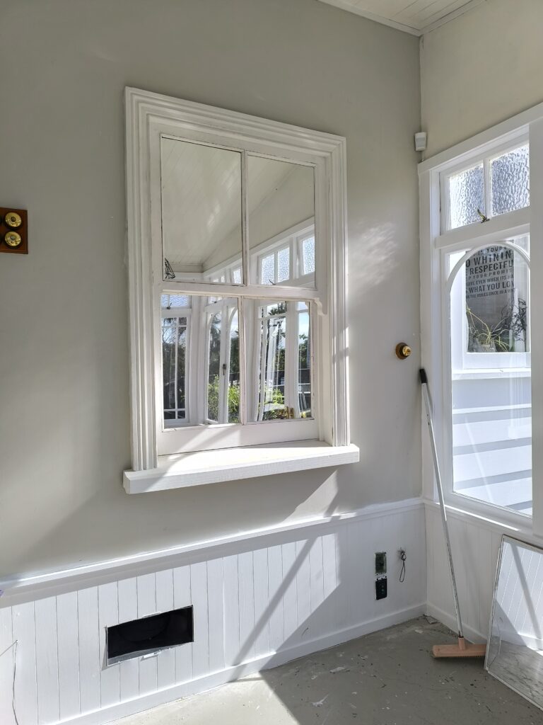 After repairs, mirror window finds its usual way to reflect the lights and views